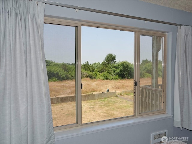 615 Ocean Shores Blvd NW Unit 210, Ocean Shores, WA 98569 - doorway to outside with plenty of natural light