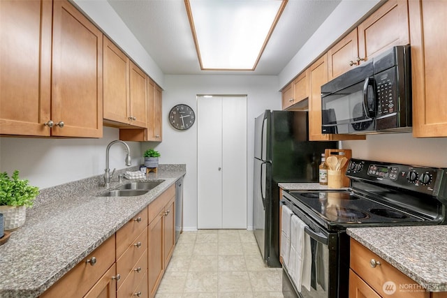 7324 N Skyview Ln Unit N102, Tacoma, WA 98406 - kitchen featuring black appliances and brown cabinets