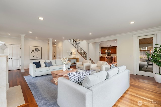 603 9th Ave, Kirkland, WA 98033 - living area featuring decorative columns, ornamental molding, recessed lighting, stairs, and wood finished floors