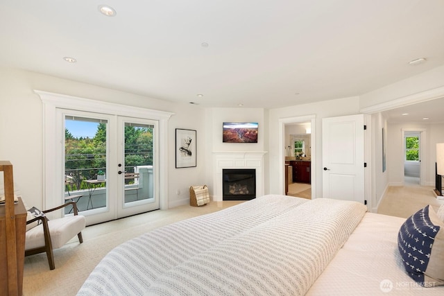 603 9th Ave, Kirkland, WA 98033 - bedroom with access to exterior, french doors, light carpet, multiple windows, and recessed lighting