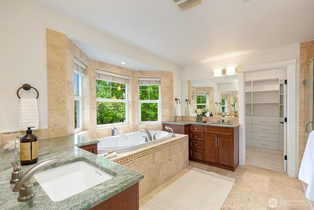 603 9th Ave, Kirkland, WA 98033 - full bath featuring two vanities, a garden tub, a stall shower, and stone finish floors