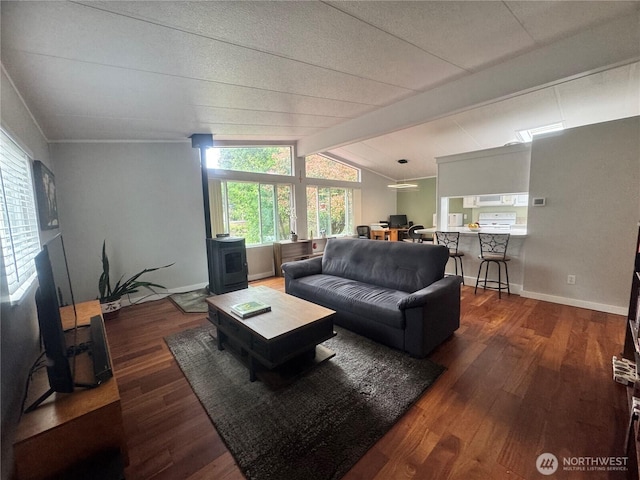 3611 I St NE Unit 291, Auburn, WA 98002 - living area with a wood stove, wood finished floors, and a desk