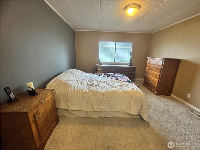 3611 I St NE Unit 291, Auburn, WA 98002 - bedroom featuring light carpet, ornamental molding, and a textured ceiling