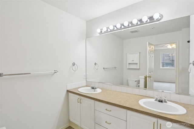 21616 9th Ave SE Unit C-105, Bothell, WA 98021 - full bathroom featuring double vanity and toilet