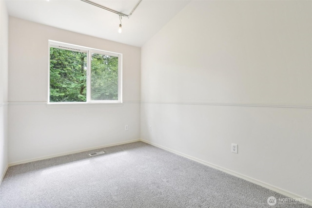21616 9th Ave SE Unit C-105, Bothell, WA 98021 - empty room with carpet flooring and attic access