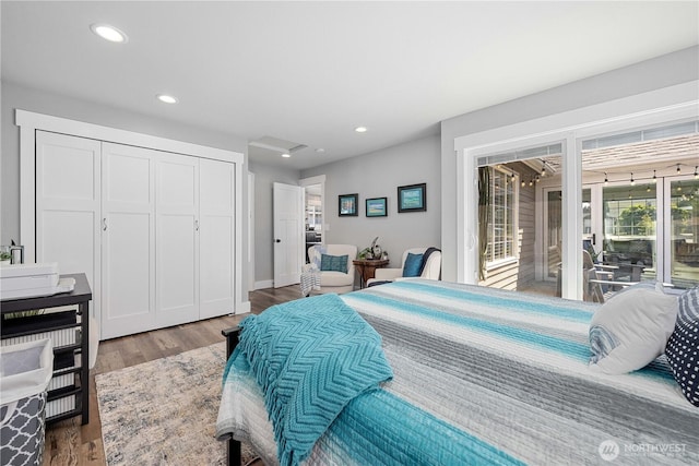 214 S Bradley St, Chelan, WA 98816 - bedroom featuring access to exterior, wood finished floors, recessed lighting, and a closet