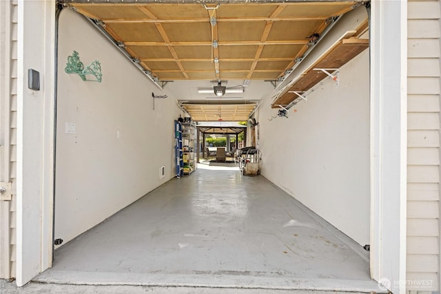 214 S Bradley St, Chelan, WA 98816 - garage featuring a garage door opener