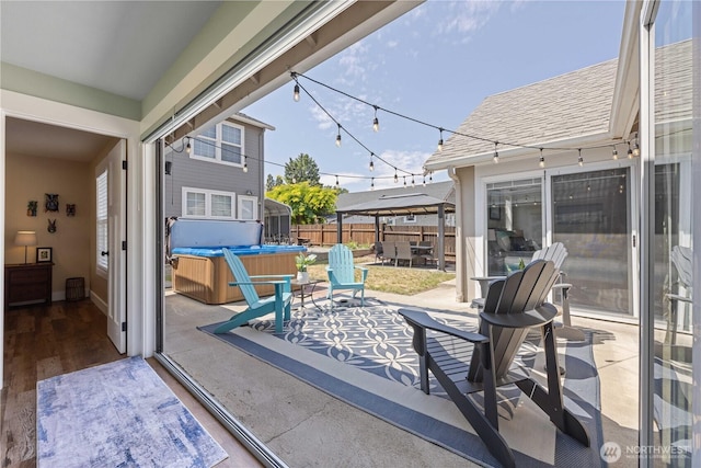 214 S Bradley St, Chelan, WA 98816 - view of patio / terrace with a hot tub