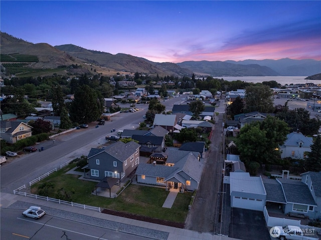 214 S Bradley St, Chelan, WA 98816 - aerial view at dusk of a mountain view and a residential view