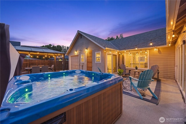 214 S Bradley St, Chelan, WA 98816 - view of patio / terrace featuring a hot tub, outdoor dining space, and a gazebo