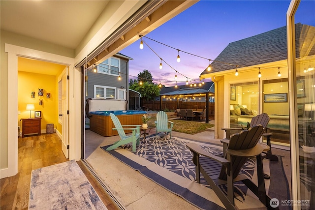 214 S Bradley St, Chelan, WA 98816 - view of patio with a hot tub