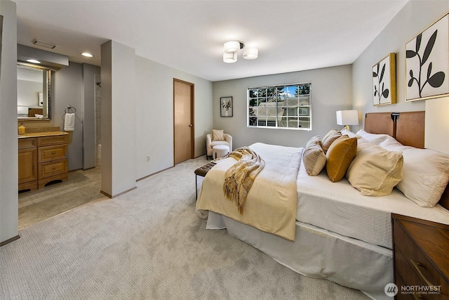 14611 NE 3rd St Unit 2, Bellevue, WA 98007 - bedroom with light colored carpet, recessed lighting, and ensuite bath