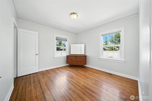 521 S Park St, Walla Walla, WA 99362 - unfurnished bedroom with wood finished floors and ornamental molding
