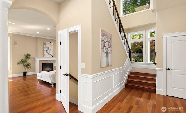 14248 SE Allen Rd, Bellevue, WA 98006 - hallway with plenty of natural light, wood finished floors, stairway, recessed lighting, and a towering ceiling
