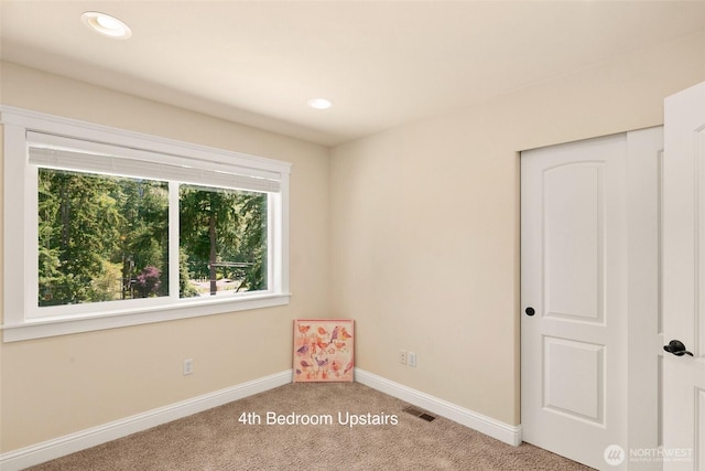 14248 SE Allen Rd, Bellevue, WA 98006 - empty room featuring carpet flooring and recessed lighting