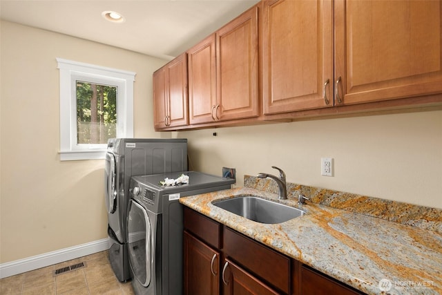 14248 SE Allen Rd, Bellevue, WA 98006 - laundry room with cabinet space, separate washer and dryer, recessed lighting, and light tile patterned floors