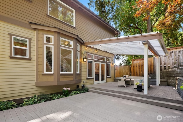 14248 SE Allen Rd, Bellevue, WA 98006 - wooden deck with french doors, an outdoor hangout area, and a pergola