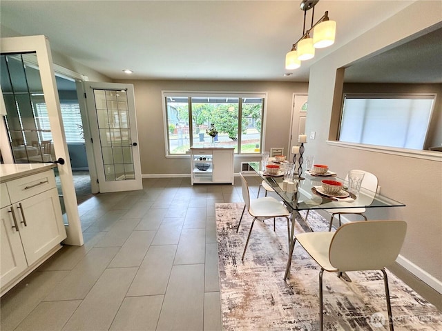 1221 E 63rd St, Tacoma, WA 98404 - tiled dining area featuring baseboards and recessed lighting