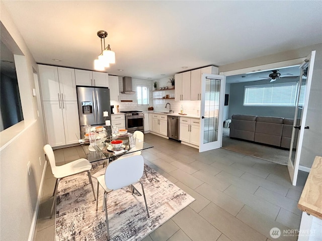 1221 E 63rd St, Tacoma, WA 98404 - dining room with a ceiling fan and tile patterned floors