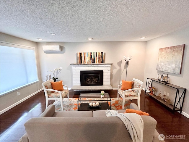 1221 E 63rd St, Tacoma, WA 98404 - living area with a wall mounted AC, recessed lighting, a brick fireplace, and a textured ceiling