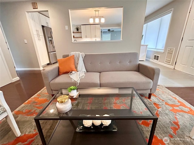 1221 E 63rd St, Tacoma, WA 98404 - living room featuring wood finished floors and ceiling fan