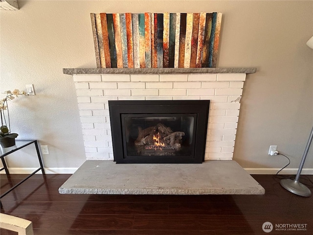 1221 E 63rd St, Tacoma, WA 98404 - detailed view of a brick fireplace and wood finished floors