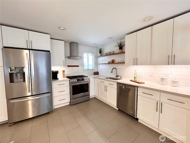 1221 E 63rd St, Tacoma, WA 98404 - kitchen featuring appliances with stainless steel finishes, wall chimney range hood, open shelves, and tasteful backsplash