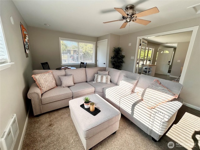 1221 E 63rd St, Tacoma, WA 98404 - living area with plenty of natural light, ceiling fan, and carpet