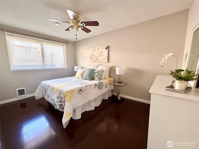 1221 E 63rd St, Tacoma, WA 98404 - bedroom featuring dark wood-style floors and ceiling fan