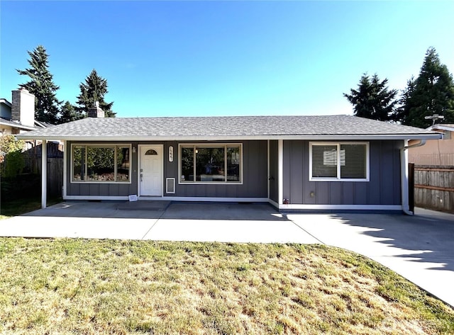 1221 E 63rd St, Tacoma, WA 98404 - ranch-style home with board and batten siding and roof with shingles