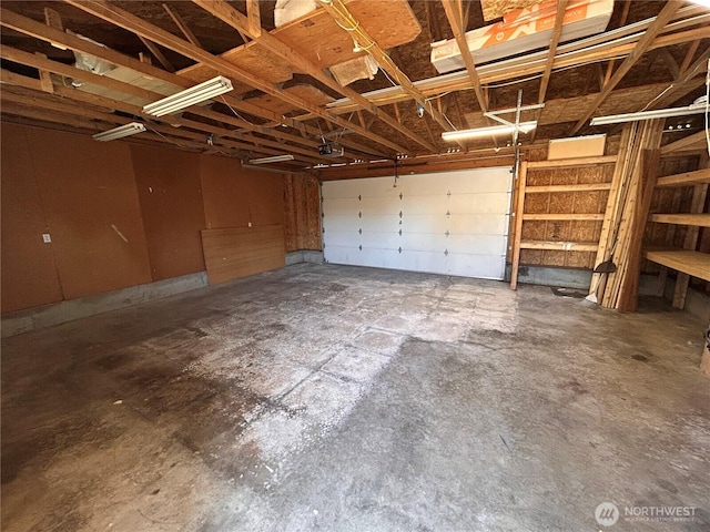 1221 E 63rd St, Tacoma, WA 98404 - garage featuring a garage door opener