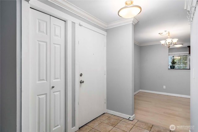 1839 S 286th Ln Unit S-201, Federal Way, WA 98003 - foyer entrance featuring crown molding, a chandelier, and light tile patterned flooring
