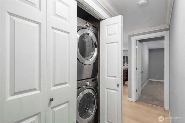 1839 S 286th Ln Unit S-201, Federal Way, WA 98003 - washroom with stacked washer and clothes dryer and light wood-style floors