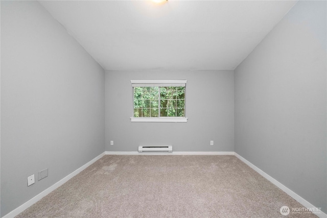 1839 S 286th Ln Unit S-201, Federal Way, WA 98003 - empty room with a baseboard heating unit and carpet flooring