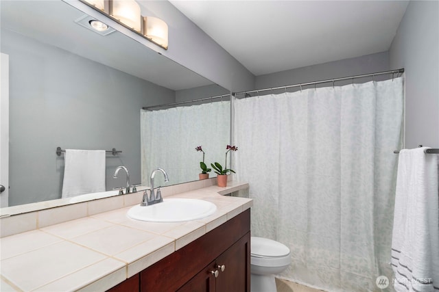 1839 S 286th Ln Unit S-201, Federal Way, WA 98003 - full bathroom featuring toilet and vanity