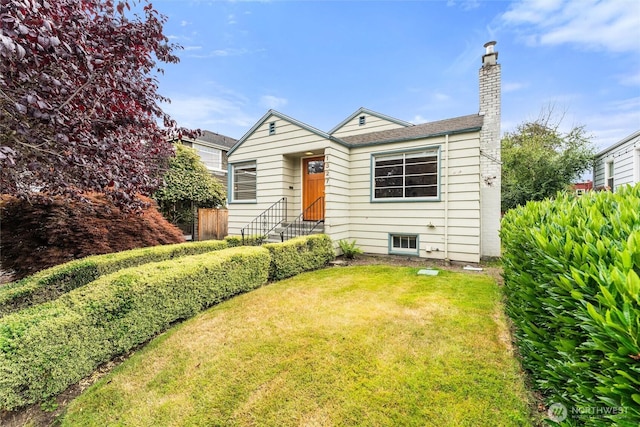 1327 N 79th St, Seattle, WA 98103 - view of front of home featuring a front lawn and a chimney