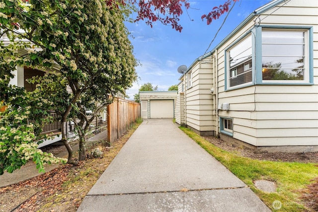 1327 N 79th St, Seattle, WA 98103 - view of side of property featuring an outdoor structure and a garage