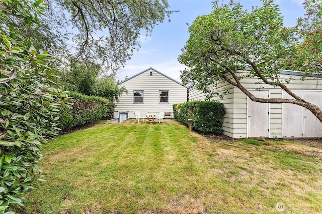 1327 N 79th St, Seattle, WA 98103 - view of grassy yard with an outbuilding
