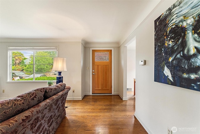 1327 N 79th St, Seattle, WA 98103 - foyer entrance featuring wood finished floors and baseboards