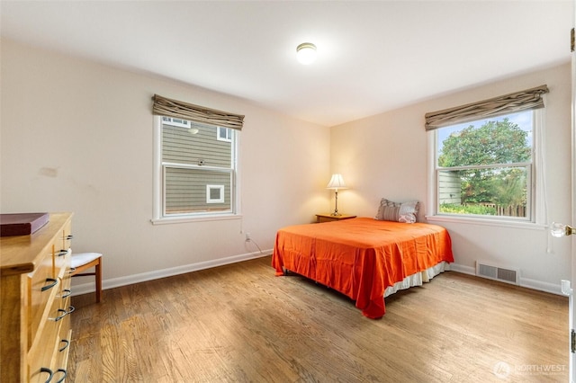 1327 N 79th St, Seattle, WA 98103 - bedroom with wood finished floors and baseboards