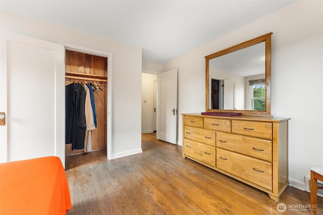 1327 N 79th St, Seattle, WA 98103 - bedroom featuring wood finished floors and a closet