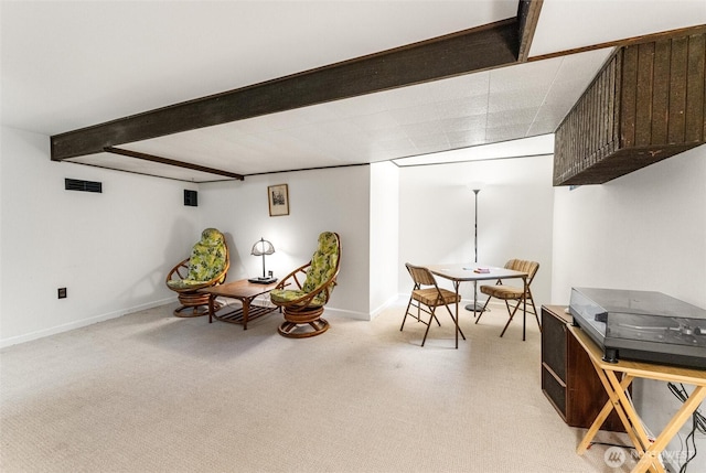 1327 N 79th St, Seattle, WA 98103 - living area with light colored carpet and beamed ceiling
