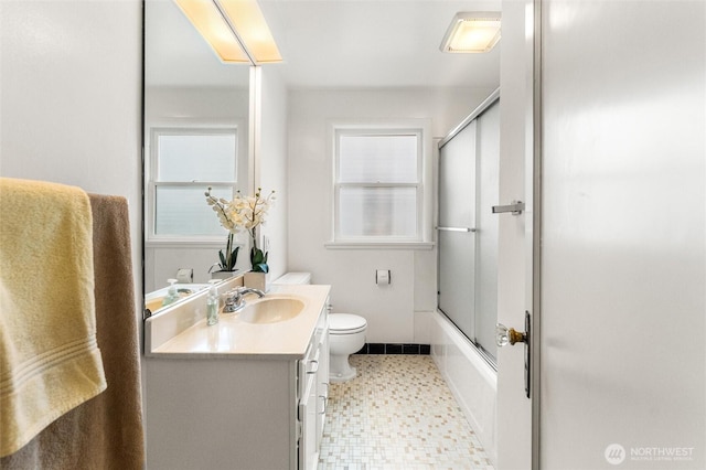 1327 N 79th St, Seattle, WA 98103 - bathroom featuring vanity, healthy amount of natural light, and enclosed tub / shower combo