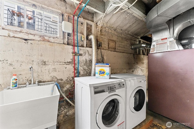 1327 N 79th St, Seattle, WA 98103 - washroom with washing machine and clothes dryer and heating unit