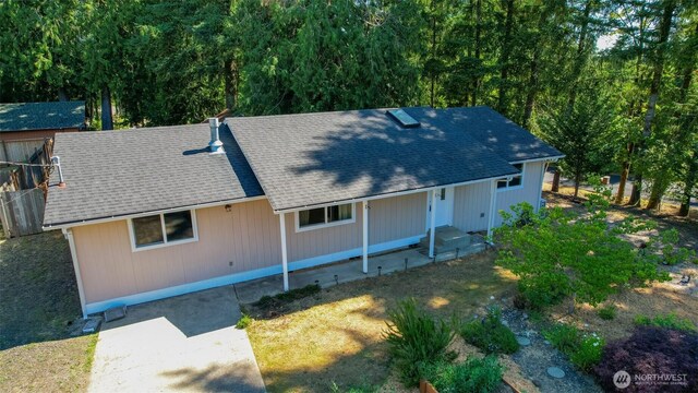 7601 Greenridge Loop SW, Olympia, WA 98512 - view of front of property featuring a shingled roof and a porch