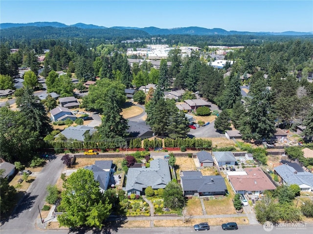 717 Cushing St SW, Olympia, WA 98502 - aerial view of property and surrounding area with a mountainous background and nearby suburban area