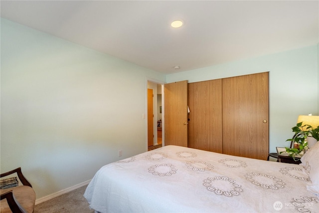 717 Cushing St SW, Olympia, WA 98502 - carpeted bedroom featuring baseboards and a closet