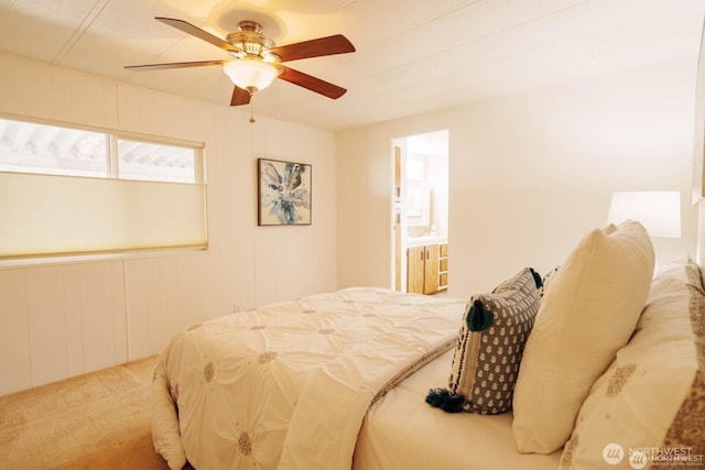 1121 244th St SW Unit 49, Bothell, WA 98021 - carpeted bedroom featuring a ceiling fan and ensuite bath