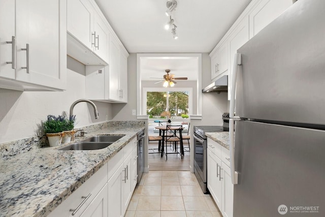 12700 NE 8th St Unit E-205, Bellevue, WA 98005 - kitchen featuring stainless steel appliances, under cabinet range hood, white cabinets, and ceiling fan