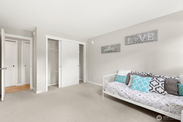 12700 NE 8th St Unit E-205, Bellevue, WA 98005 - bedroom featuring carpet flooring and a closet
